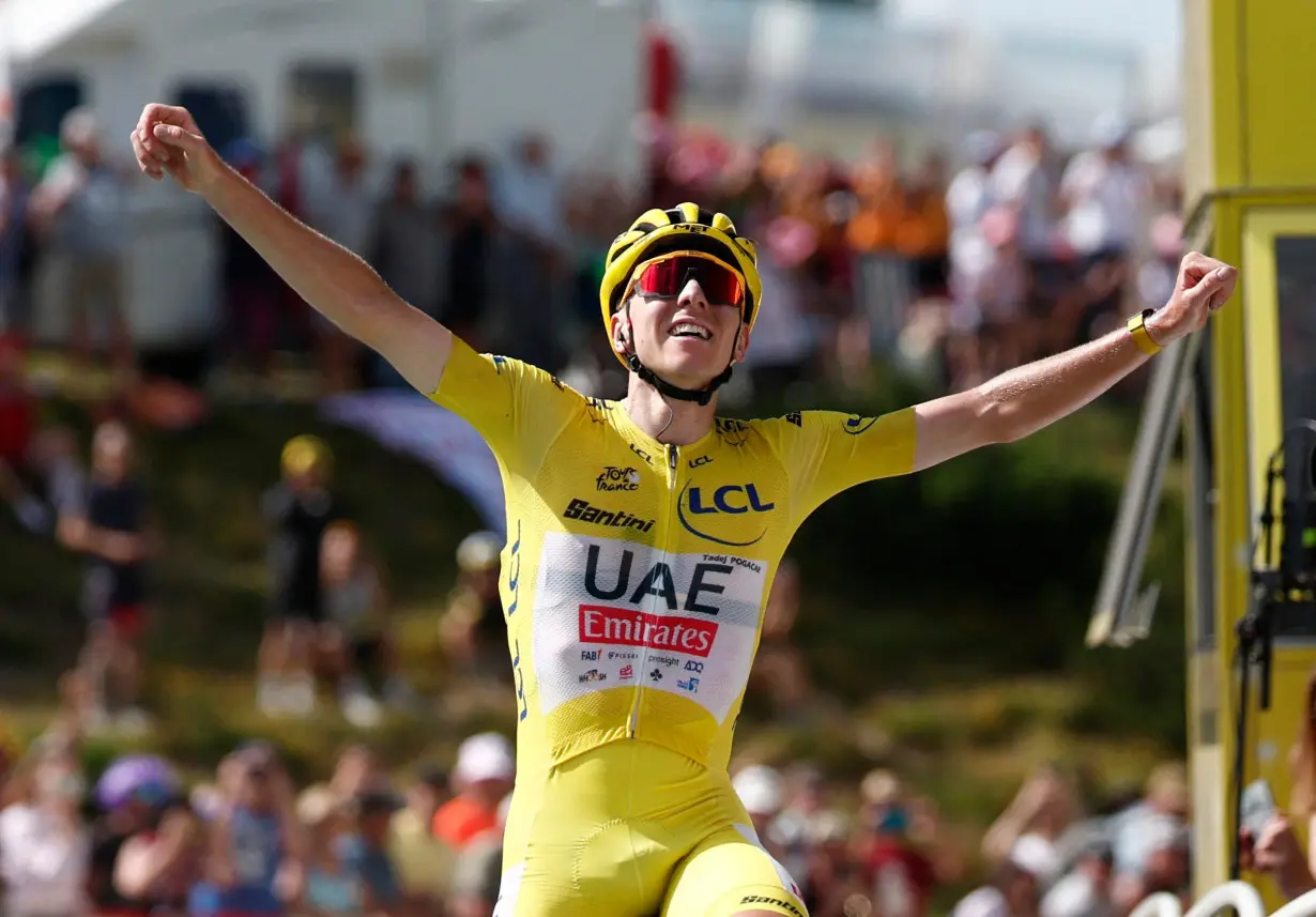 Cycling-Pogacar rides solo to stage 15 win, extends Tour lead