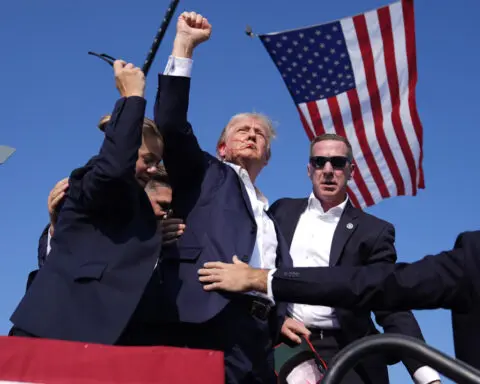 In a world of moving pictures, photographs capture indelible moments in Trump assassination attempt