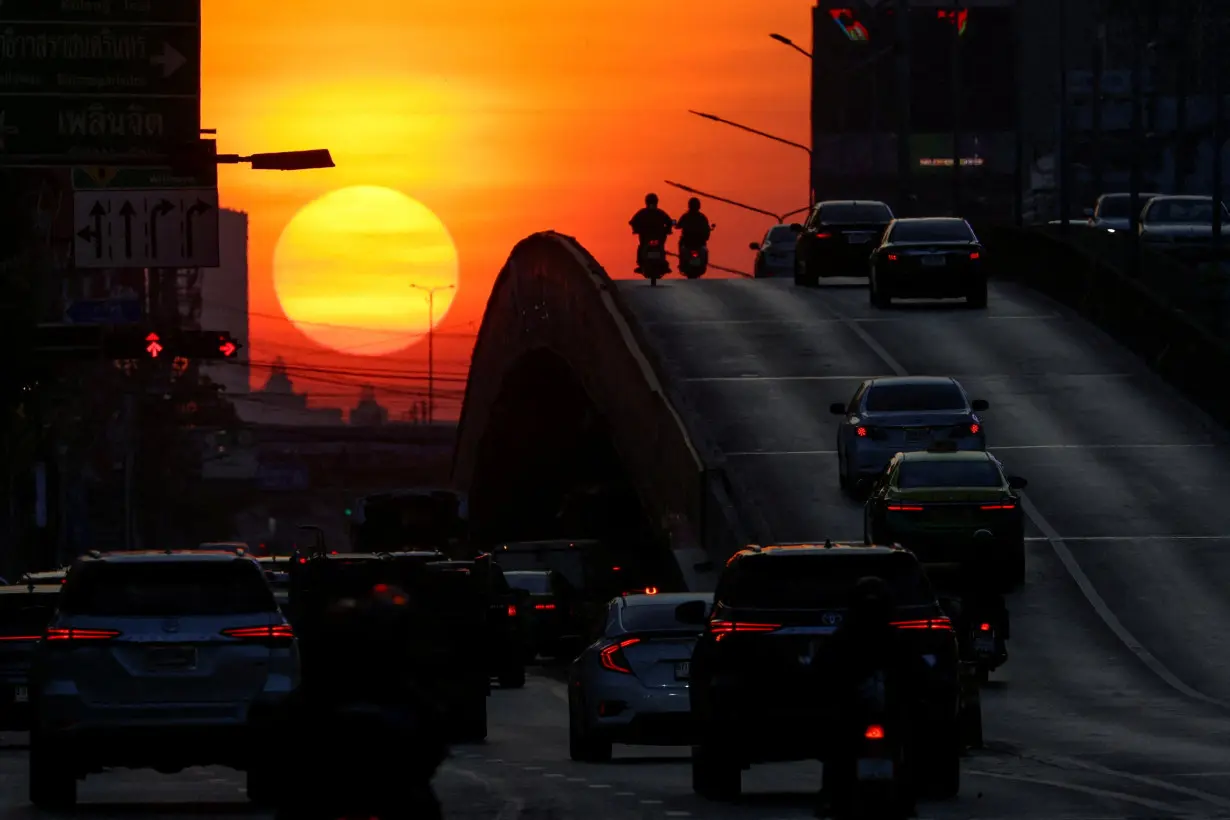 FILE PHOTO: A view of traffic during sunrise in Bangkok