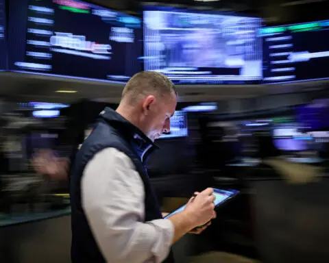 Wall St ends higher as investors firm bets on Trump win, rate cuts