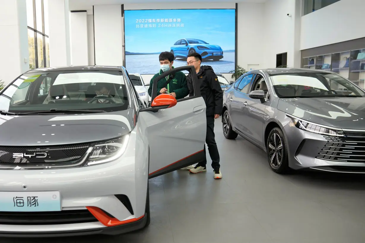 BYD EVs at a car dealership in Shanghai