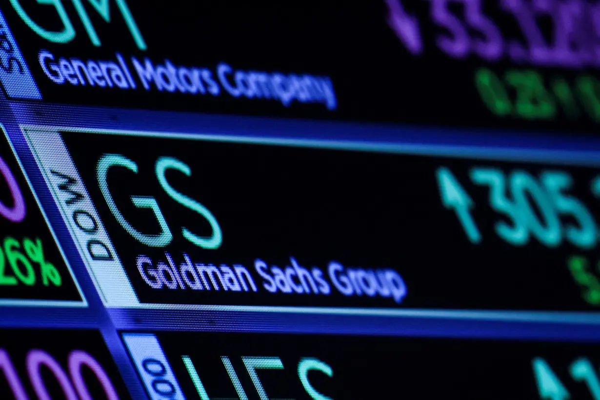 FILE PHOTO: A screen displays the trading information for Goldman Sachs on the floor of the NYSE in New York