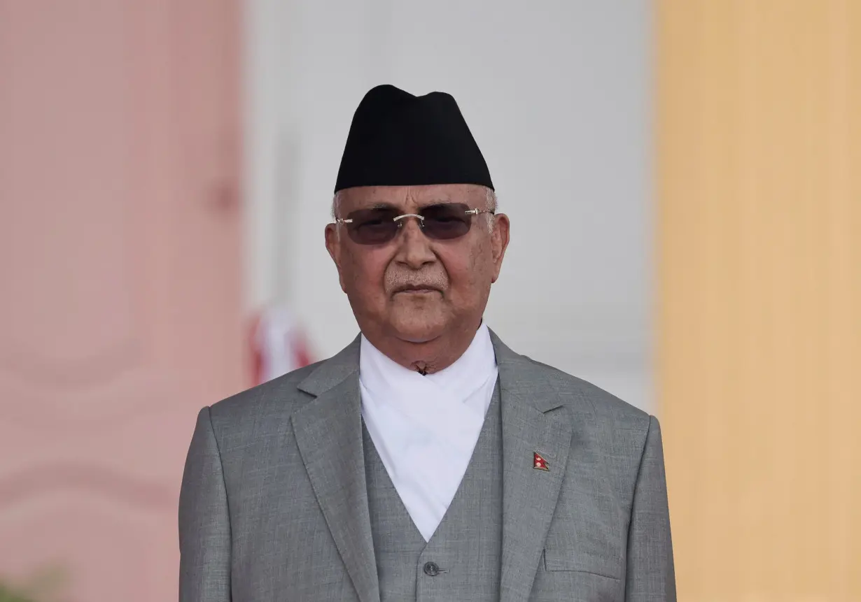 Newly appointed Prime Minister KP Sharma Oli takes the oath of office at the presidential building in Kathmandu