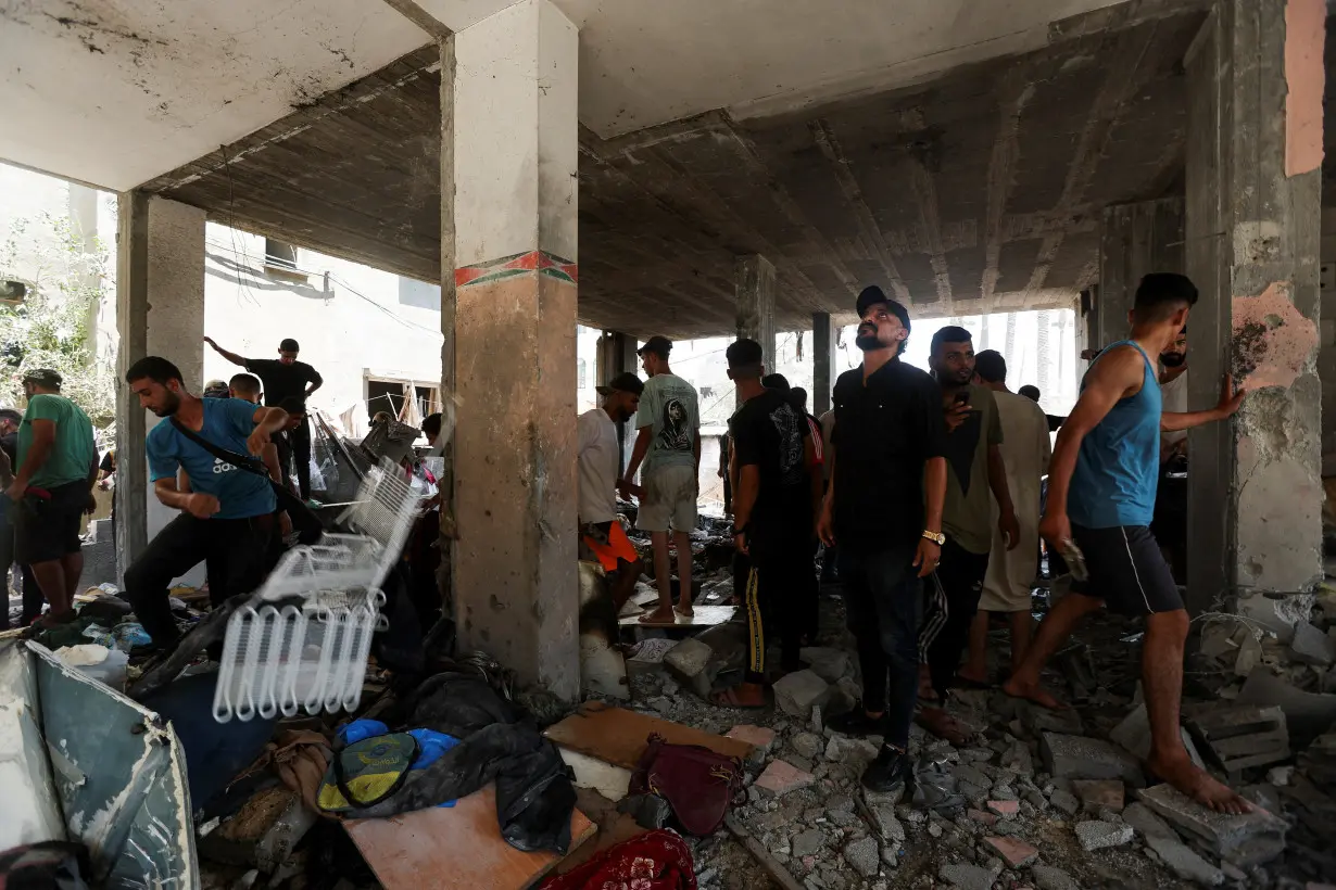 Aftermath of an Israeli strike on a house, in Deir Al-Balah in the central Gaza Strip