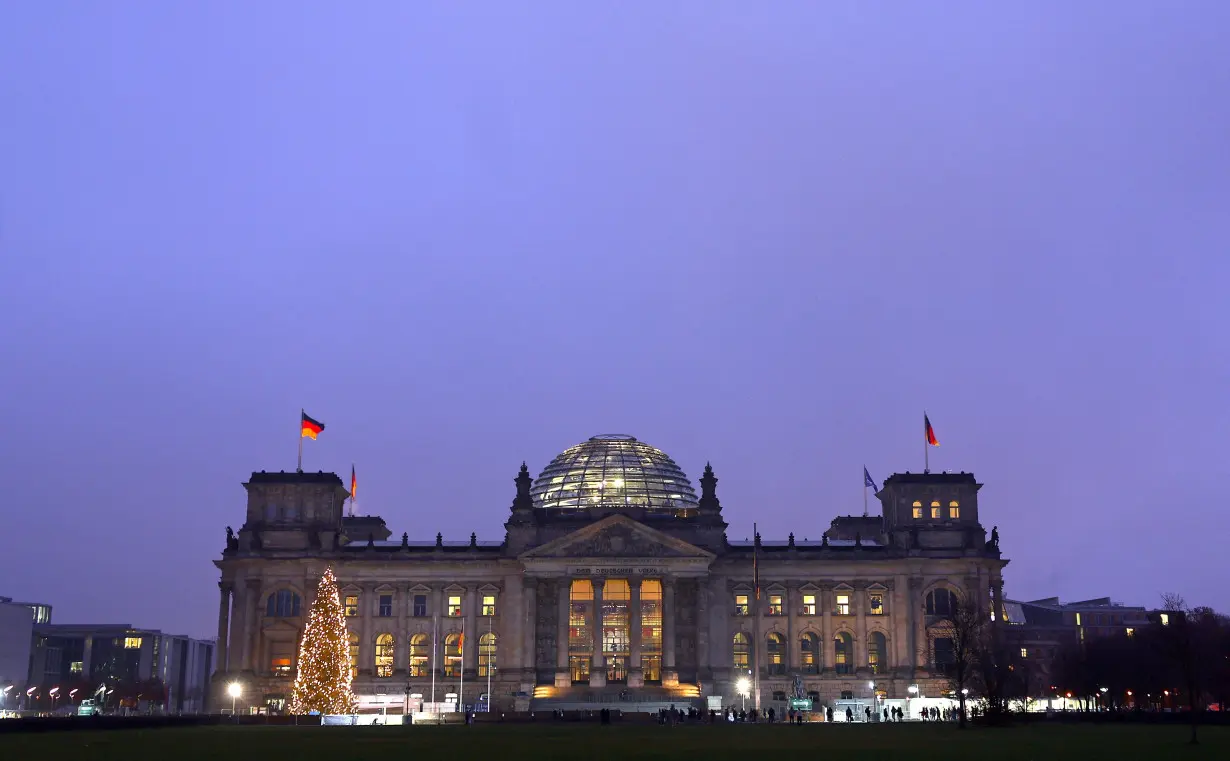 The illuminated Reichstag building in Berlin