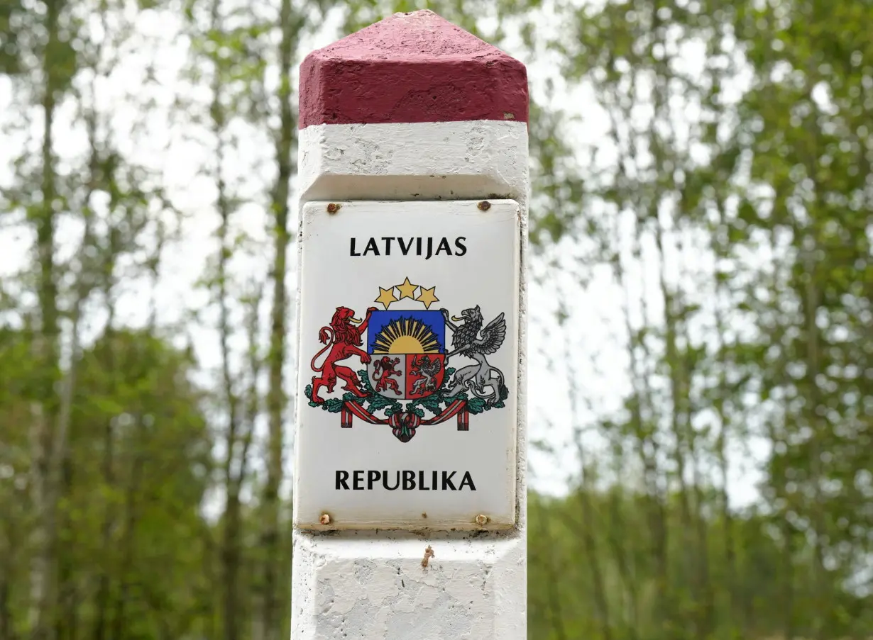 Latvian border sign is seen at Latvia-Belarus border near Robeznieki