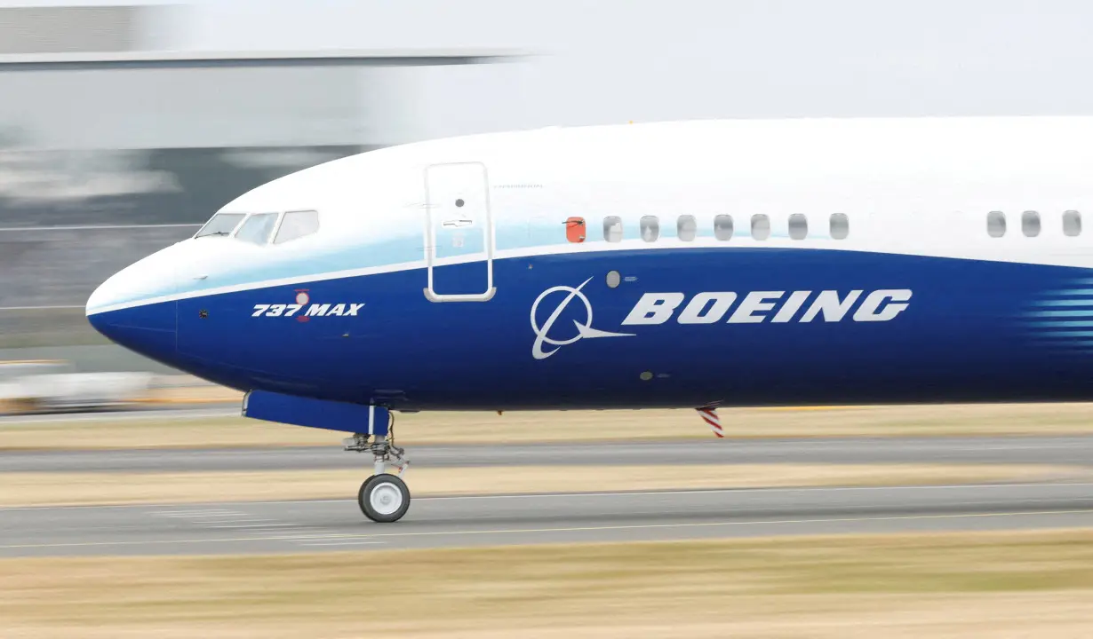 FILE PHOTO: FILE PHOTO: A Boeing 737 Max aircraft during a display at the Farnborough International Airshow, in Farnborough