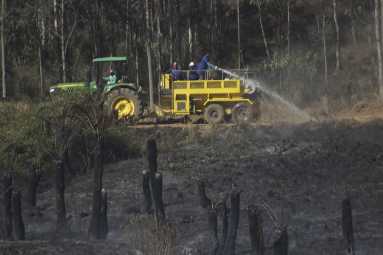 6 firefighters have died battling a bushfire in South Africa after storms batter other areas