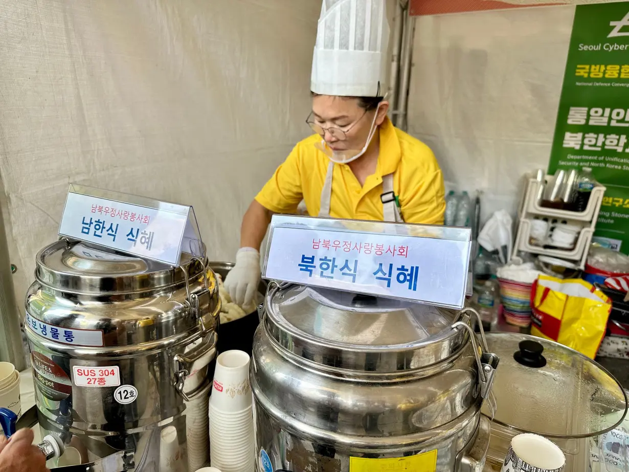 A booth set up by North Korean defectors sells traditional rice dessert drinks in both North and South Korean styles at the Defectors' Day celebration in Seoul, South Korea, on July 14.