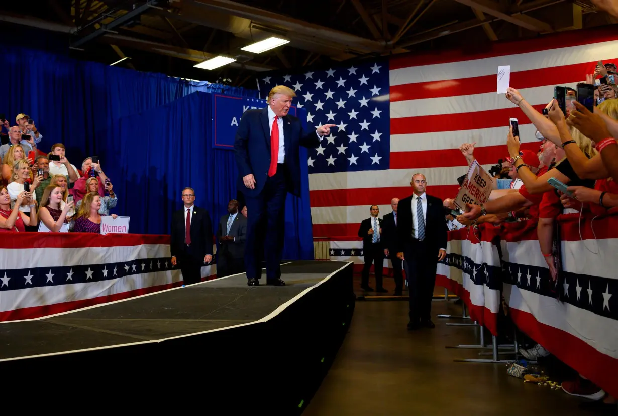 Former President Donald Trump arrives for a 