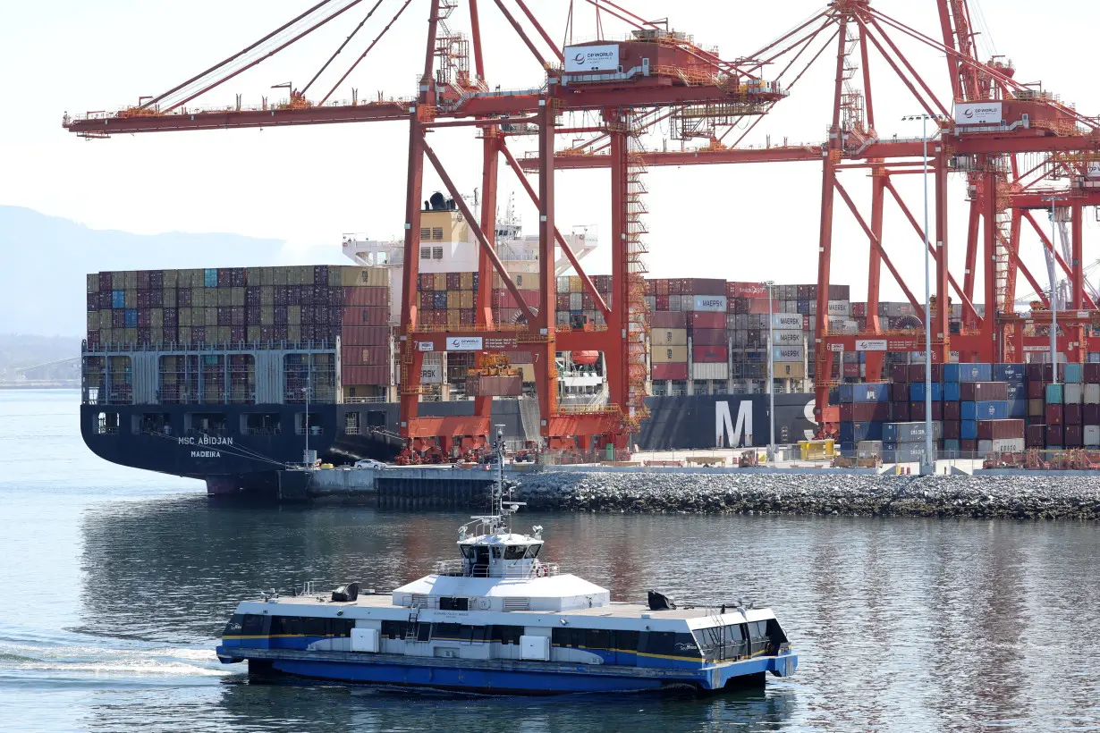 FILE PHOTO: Containers and shipping cranes at the Port of Vancouver