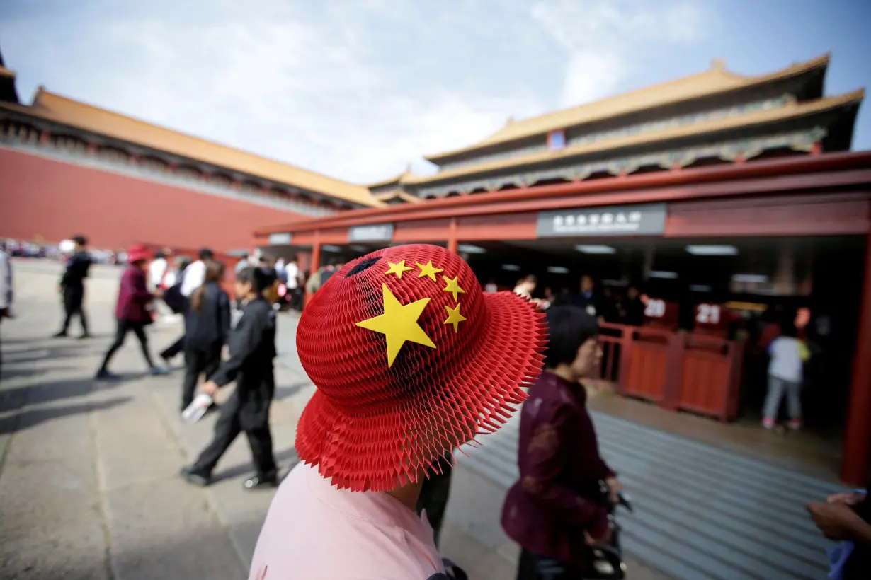 FILE PHOTO: FILE PHOTO: Tourists visit the Forbidden City in central Beijing