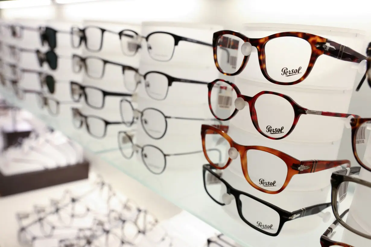 FILE PHOTO: Persol glasses are pictured for sale in a LensCrafters, both brands owned by EssilorLuxottica SA, in Manhattan, New York City