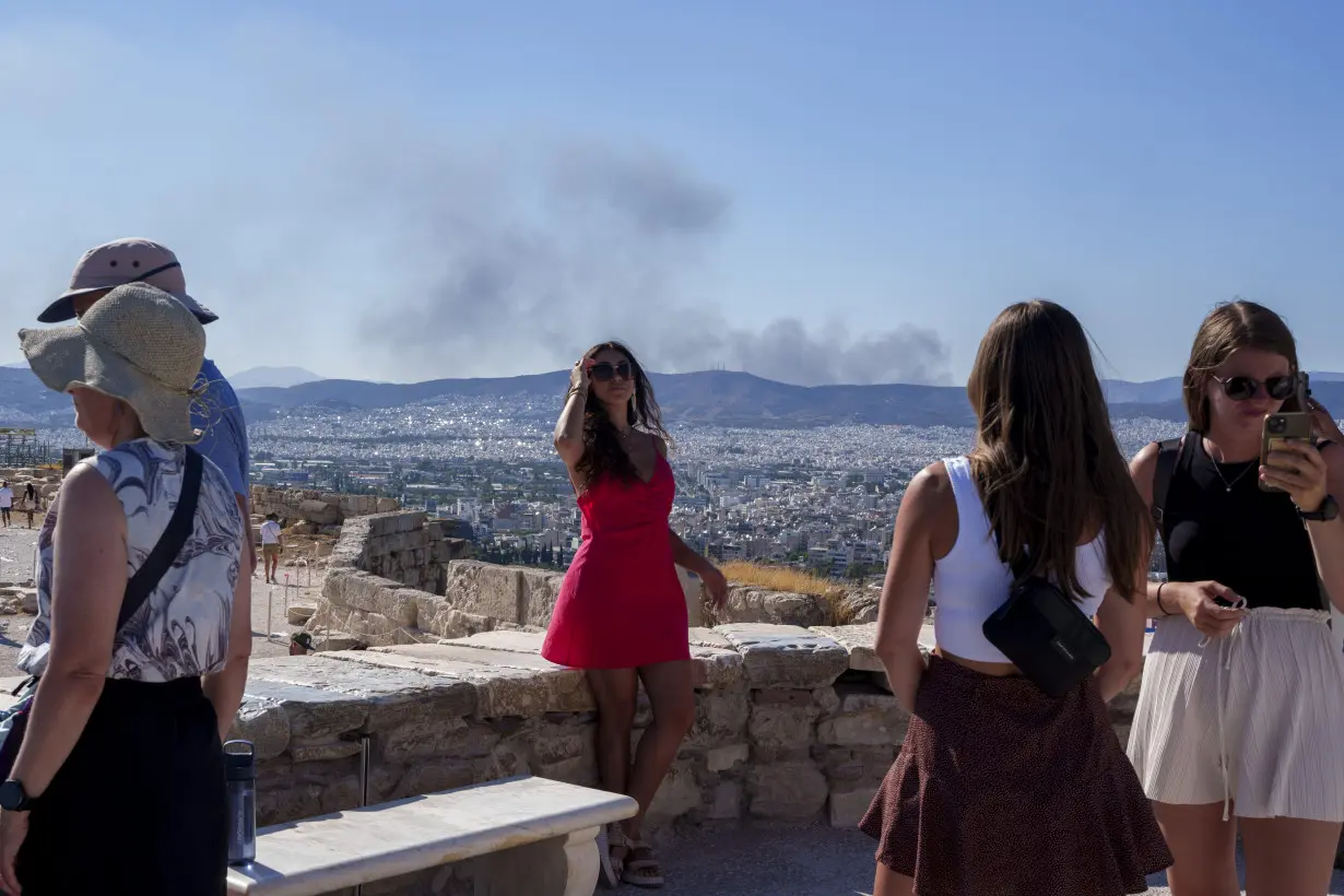 Greece shuts Acropolis, 2 firefighters killed in Italy as southern Europe swelters in a heat wave