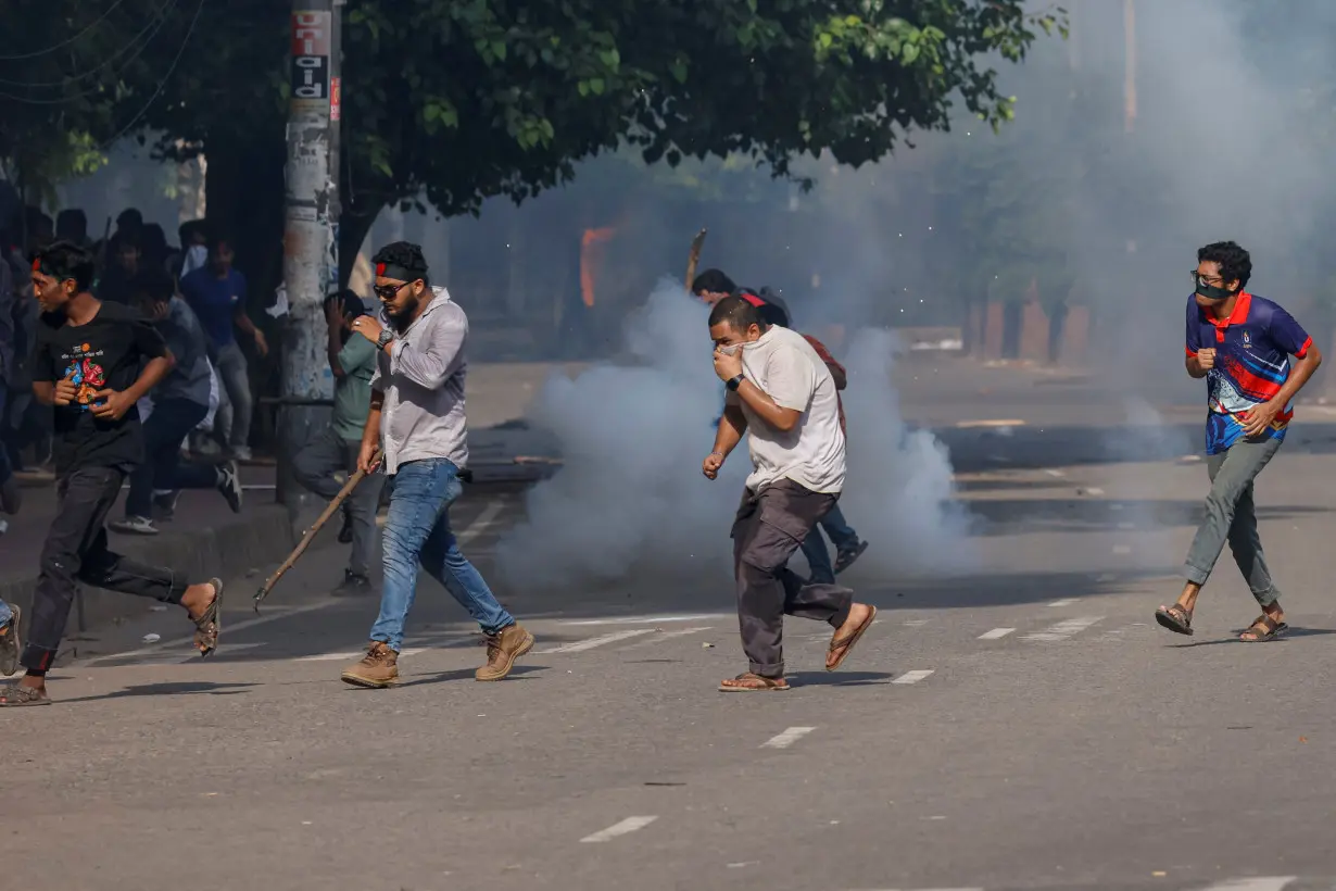 Anti-quota protesters join in a coffin rally at the University of Dhaka, in Dhaka