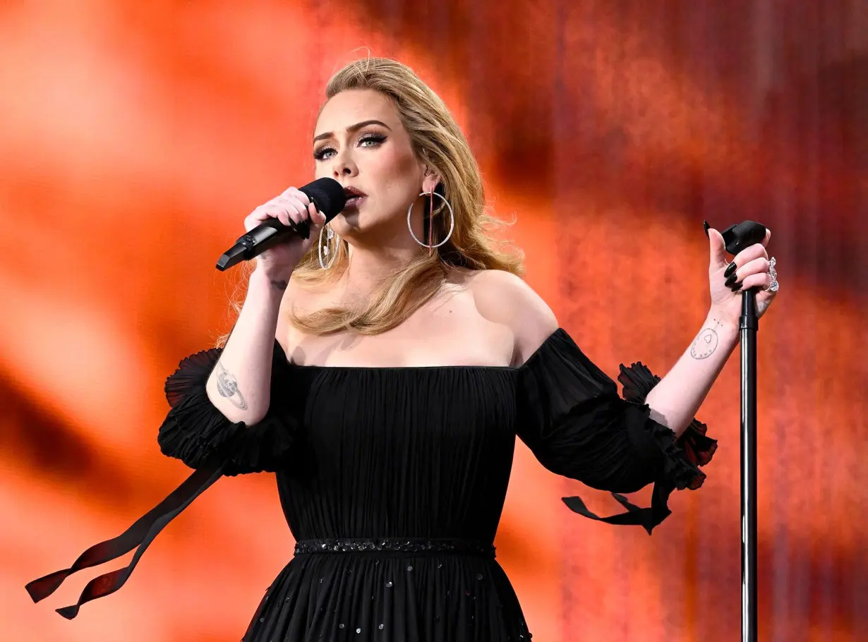 Adele's 'tank is quite empty at the minute.' She's planning a 'big break' from music