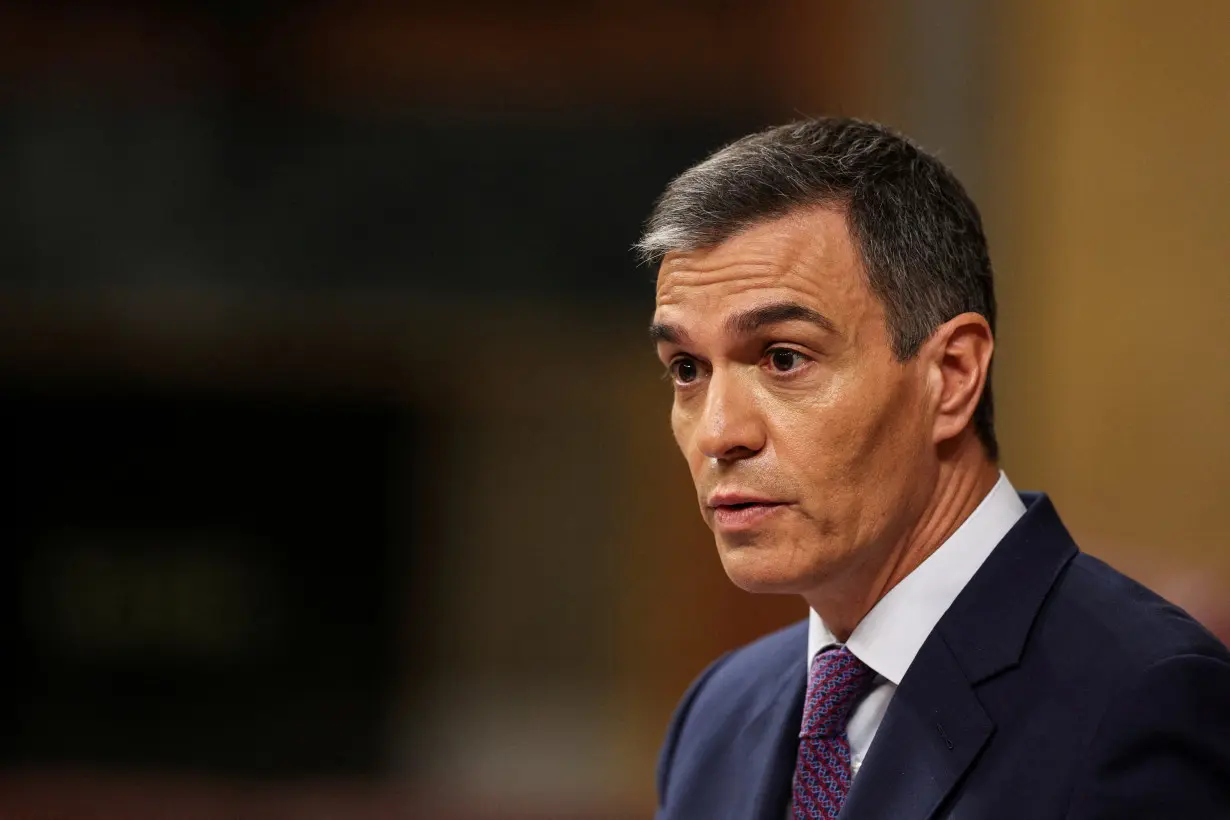 FILE PHOTO: Spanish Prime Minister Sanchez attends a plenary session of the lower house of the Spanish parliament, in Madrid