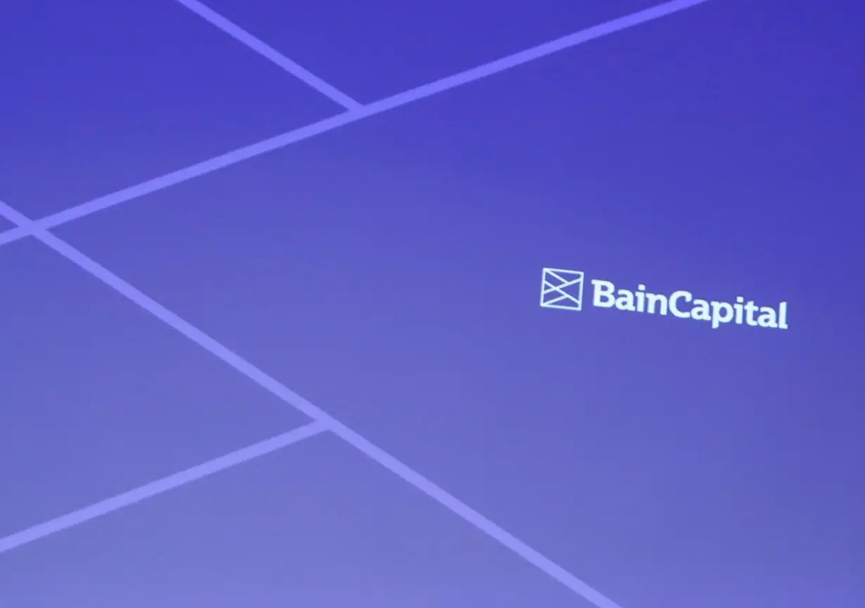 FILE PHOTO: Logo of Bain Capital is screened at a news conference in Tokyo, Japan