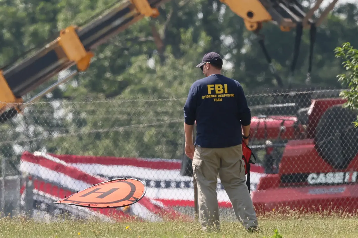 FILE PHOTO: Investigation begins after gunfire during a campaign rally by Trump in Butler, Pennsylvania