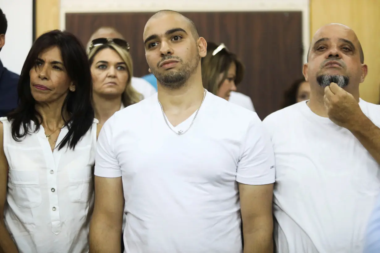 Former Israeli soldier Elor Azaria, who was convicted of manslaughter and sentenced to 18 months imprisonment for killing a wounded and incapacitated Palestinian assailant, waits to hear the ruling at an Israeli military appeals court in Tel Aviv