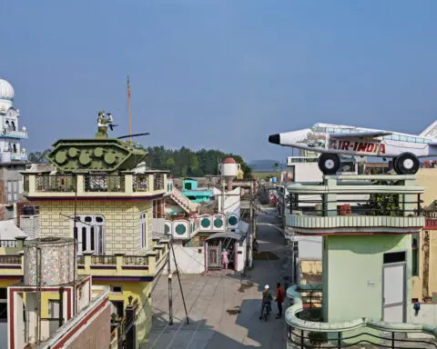 The Indian villages with rooftop sculptures of planes, tanks and cars