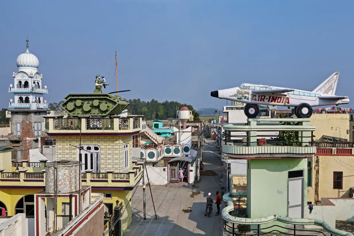 The Indian villages with rooftop sculptures of planes, tanks and cars