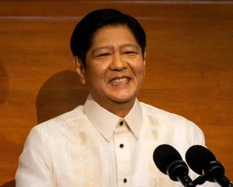 Philippine Marcos' approval, trust ratings dip - poll
