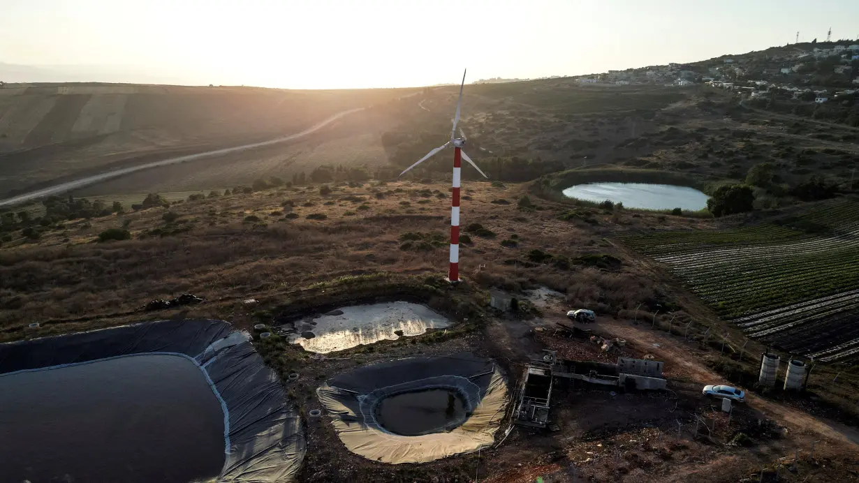 A pumped energy storage facility and a wind turbine at Kibbutz Maale Gilboa