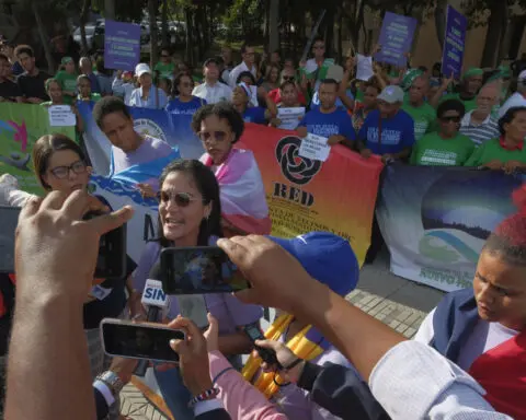 Dominican activists protest against a new criminal code that would maintain a total abortion ban
