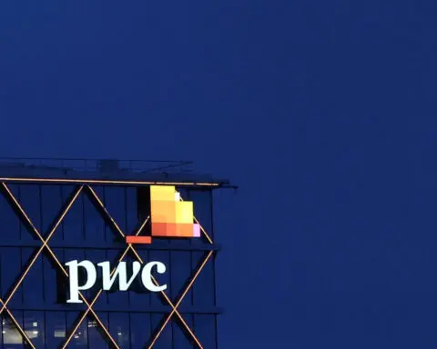 Hit by client exits, PwC to slash China partners' pay, sources say