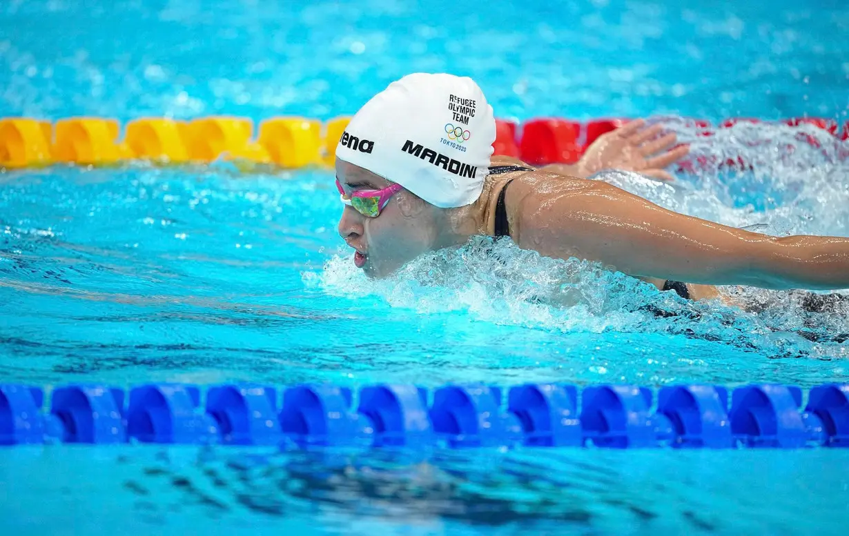 Yusra Mardini competes in the heats for the 100m butterly at the 2020 Olympics in Tokyo.