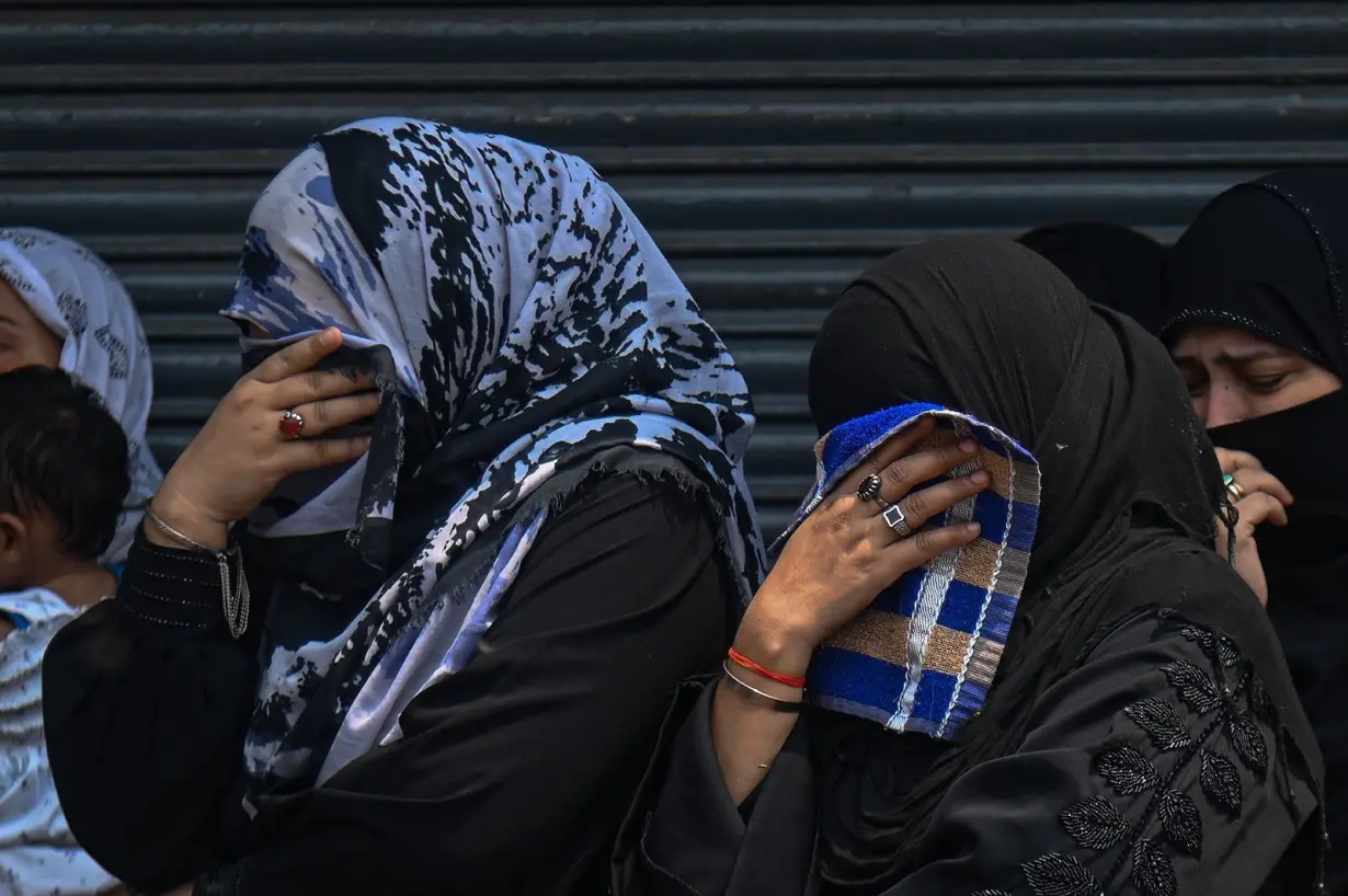 Shiite Muslim women dressed in black mark Ashura in the old quarters of New Delhi, India.