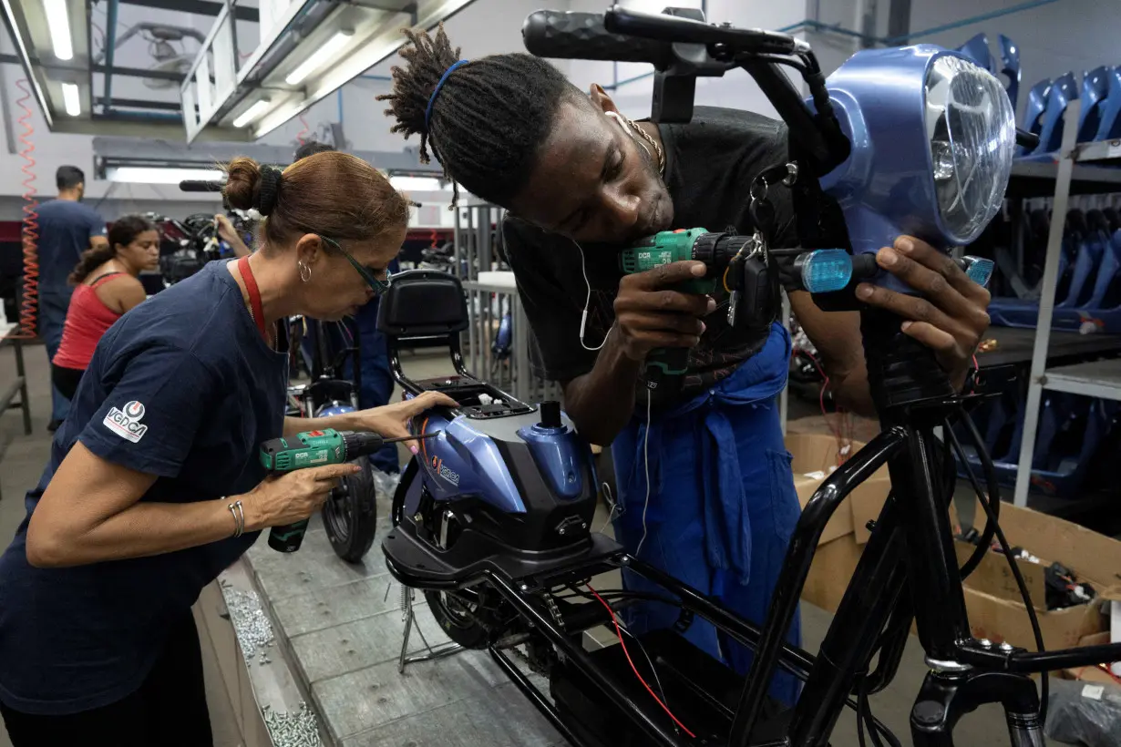 Cubans assemble Chinese electric cars and scooters in Havana amid fuel shortages