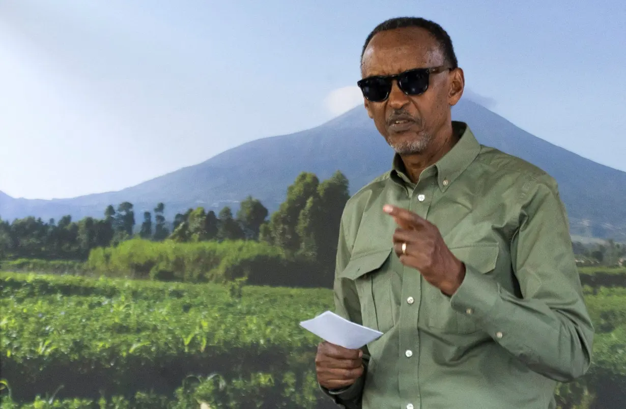 Rwanda President Paul Kagame votes during the presidential election in Kigali