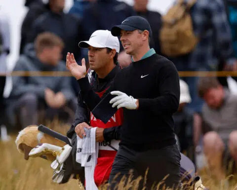 Golf-McIlroy facing Open cut after dismal opening round