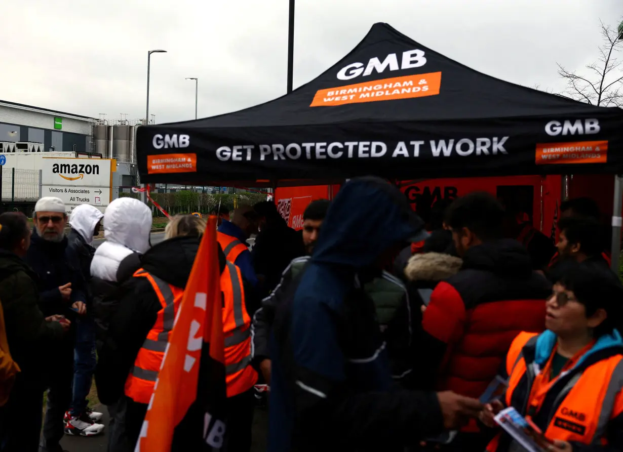 FILE PHOTO: Protestors sign up to GMB Union during industrial action outside the Amazon warehouse