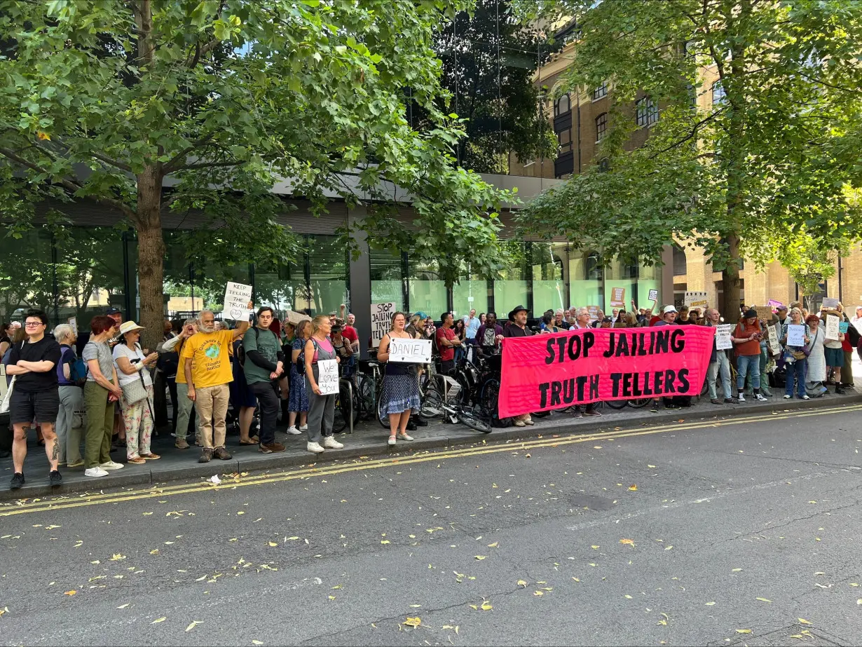 Supporters of five 'Just Stop Oil' activists jailed for conspiracy to cause a public nuisance after the sentencing demonstrate at the Southwark Crown Court in London