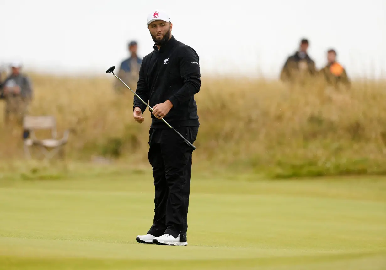 Golf-Rose rolls back the years at Troon