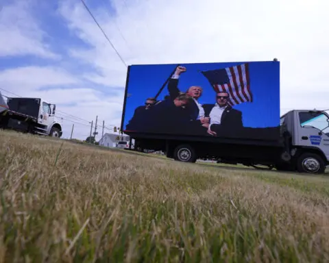 Rally shooter had photos of Trump, Biden and other US officials on his phone, AP sources say