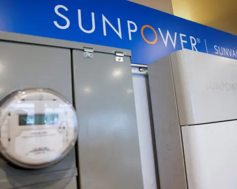 SunPower tumbles nearly 20% after pausing some operations