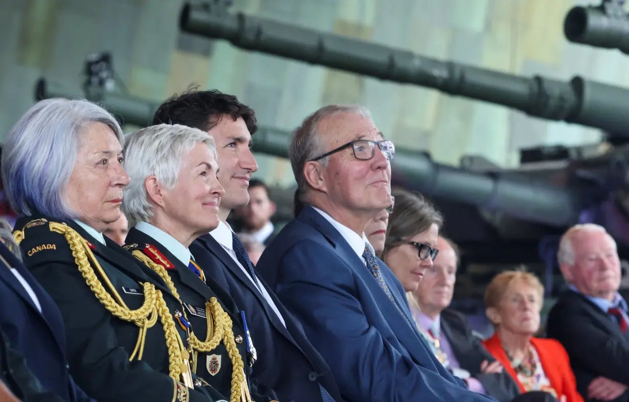 Canada's Governor General Mary Simon, General Jennie Carignan, Canada's PM Trudeau, and Canada's Minister of National Defence Bill Blair take part in a change of command ceremony as Carignan replaces General Wayne Eyre as the Canadian