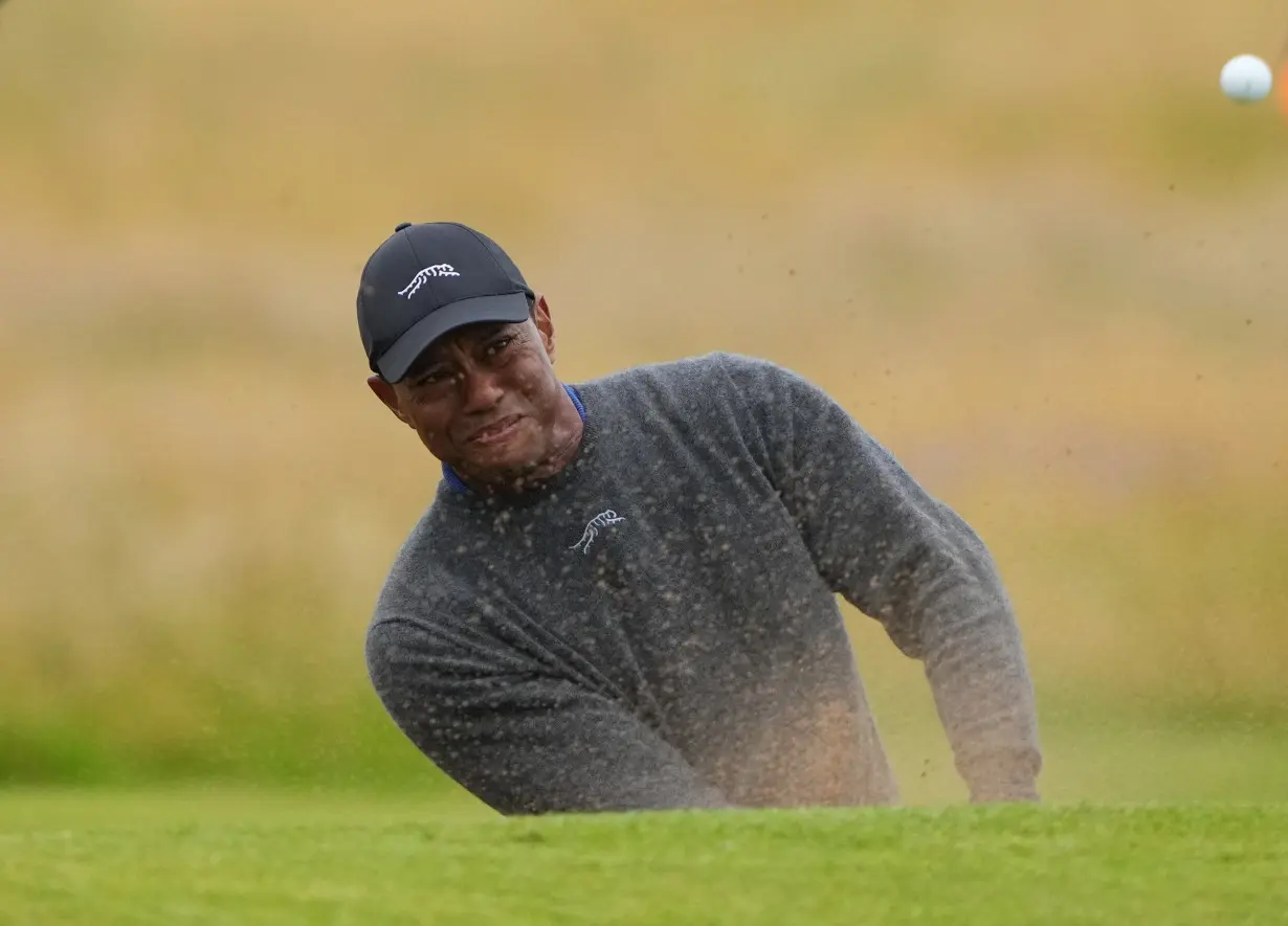 Golf-Woods tries to say positive after poor British Open start