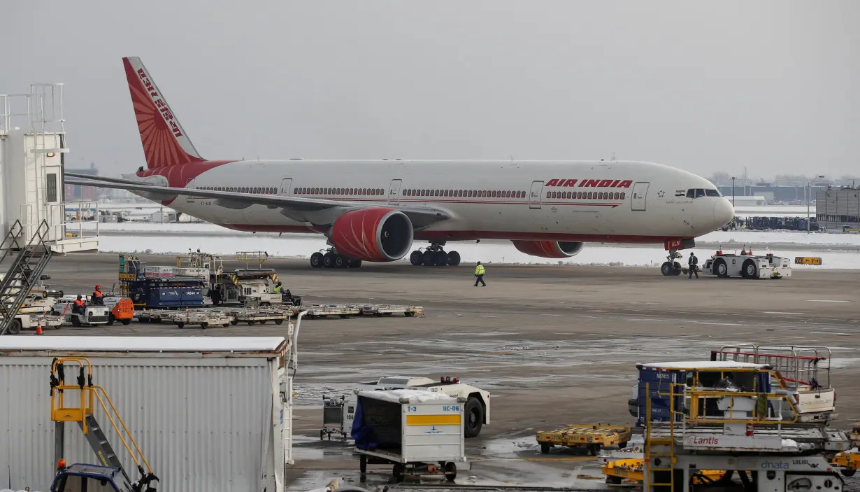 FILE PHOTO: An Air India Boeing 777 plane is towed at O'Hare International Airport in Chicago