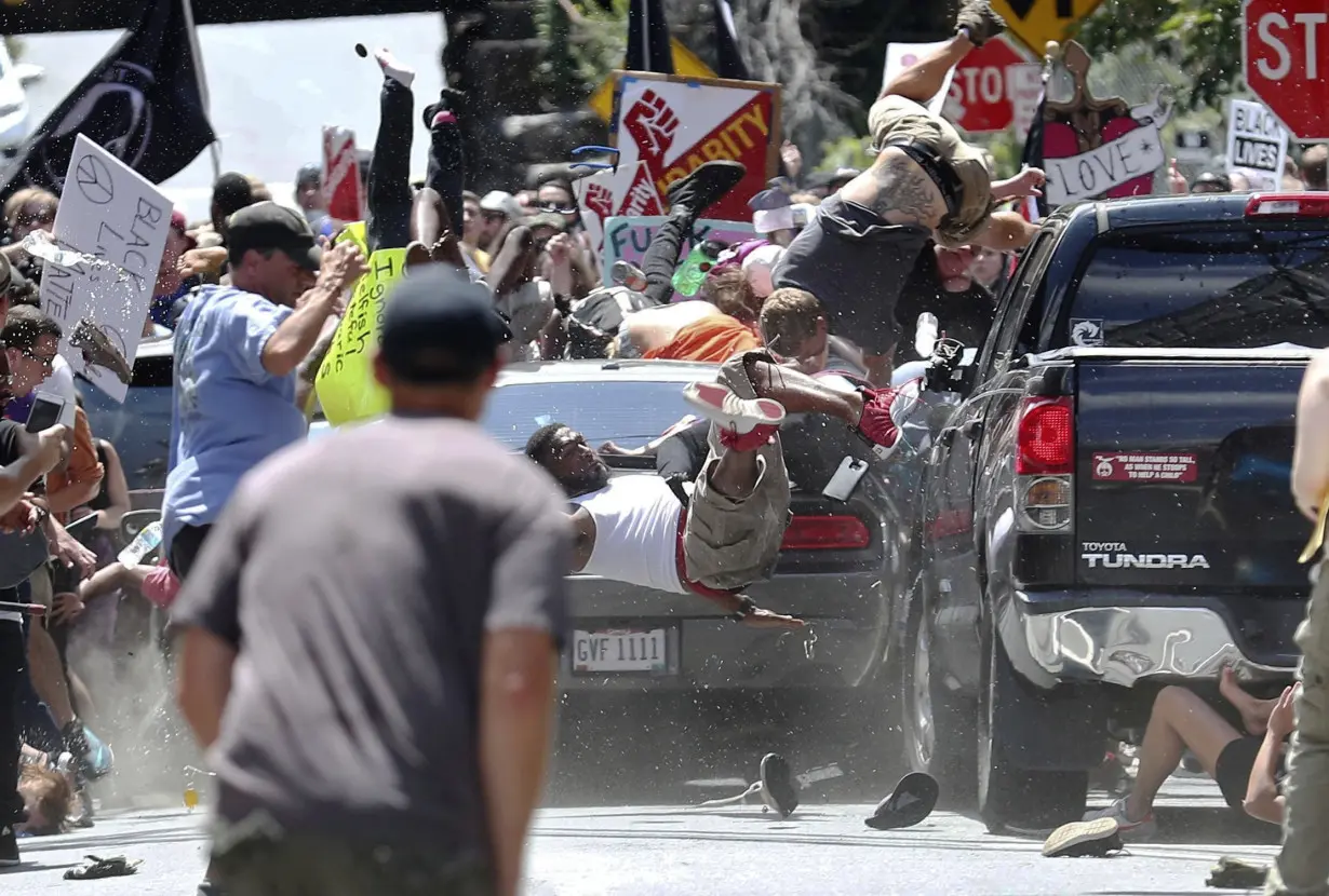 A highly unusual ruling to dismiss a case against 2 White nationalists is put on hold by a federal appeals court