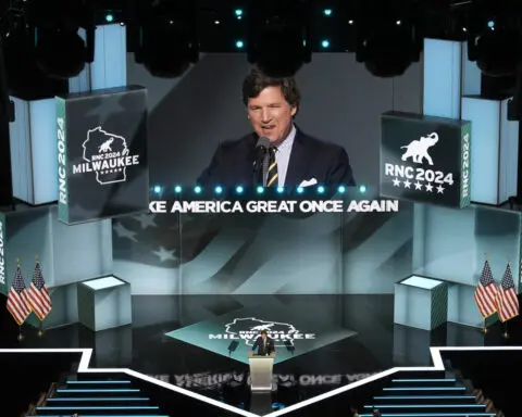 15 months after his firing, Tucker Carlson returns to Fox News airwaves with a GOP convention speech