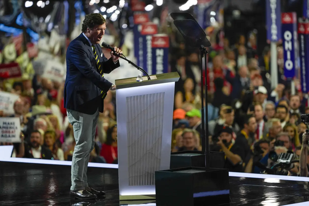 15 months after his firing, Tucker Carlson returns to Fox News airwaves with a GOP convention speech