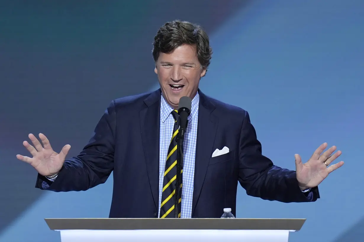 15 months after his firing, Tucker Carlson returns to Fox News airwaves with a GOP convention speech