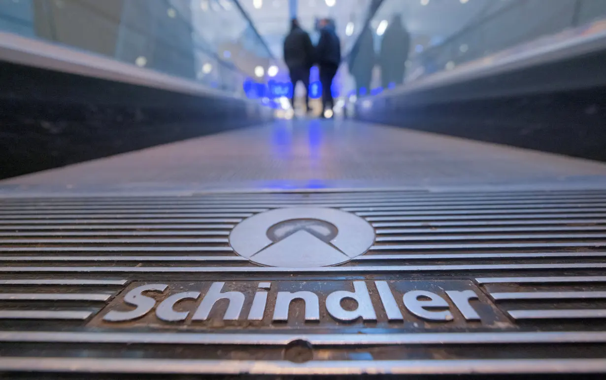 FILE PHOTO: A moving stairway of Swiss elevator maker Schindler is pictured at a mall in Neuss