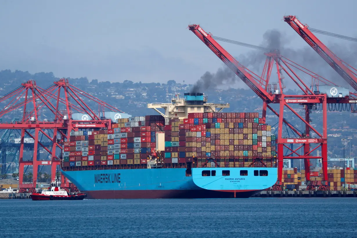 FILE PHOTO: A Maersk Line container ship prepares to depart port in Long Beach, California