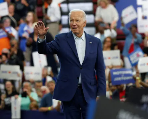 Democratic calls mount for Biden to end campaign, but he vows to fight on